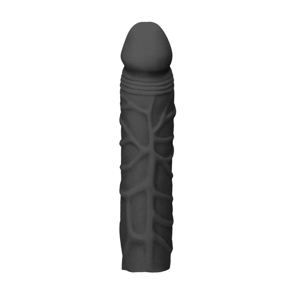 RealRock 7-inch black silicone penis sleeve by Shots Toys, showcasing realistic texture and flexible design.