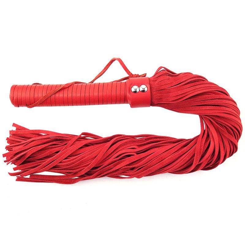Rouge Garments red suede flogger with multiple tails and a textured handle for sensory play and bondage.