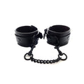Rouge Garments black ankle cuffs displayed on a white background, featuring a sleek, minimalist design.