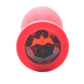 Silicone Stor Butt Plug with red jewels, featuring a smooth design and a tapered tip for comfortable use.