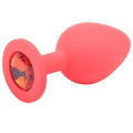 Medium red jewel-encrusted silicone butt plug from Various Toy Brands, featuring a smooth surface and decorative gem.