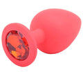 Silicone butt plug with red jewels by Various Toy Brands, showcasing a smooth design and sparkling accents.