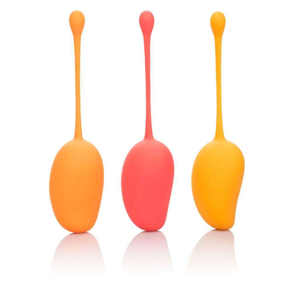 California Exotic Kegel training set in vibrant mango color, featuring three different sizes for effective pelvic floor exercises.