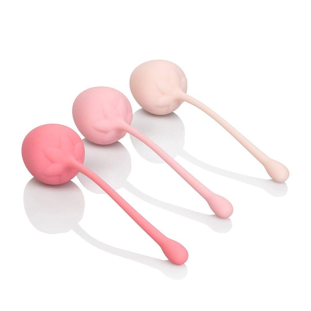 California Exotic Kegel training set featuring strawberry-shaped weights in vibrant colors on a neutral background.