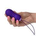 California Exotic Slay THRUSTME ribbed remote control ball in vibrant color with textured surface for enhanced pleasure.