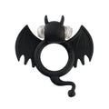 Shots Toys Badbat vibrating cock ring with textured design and adjustable fit, showcased on a neutral background.