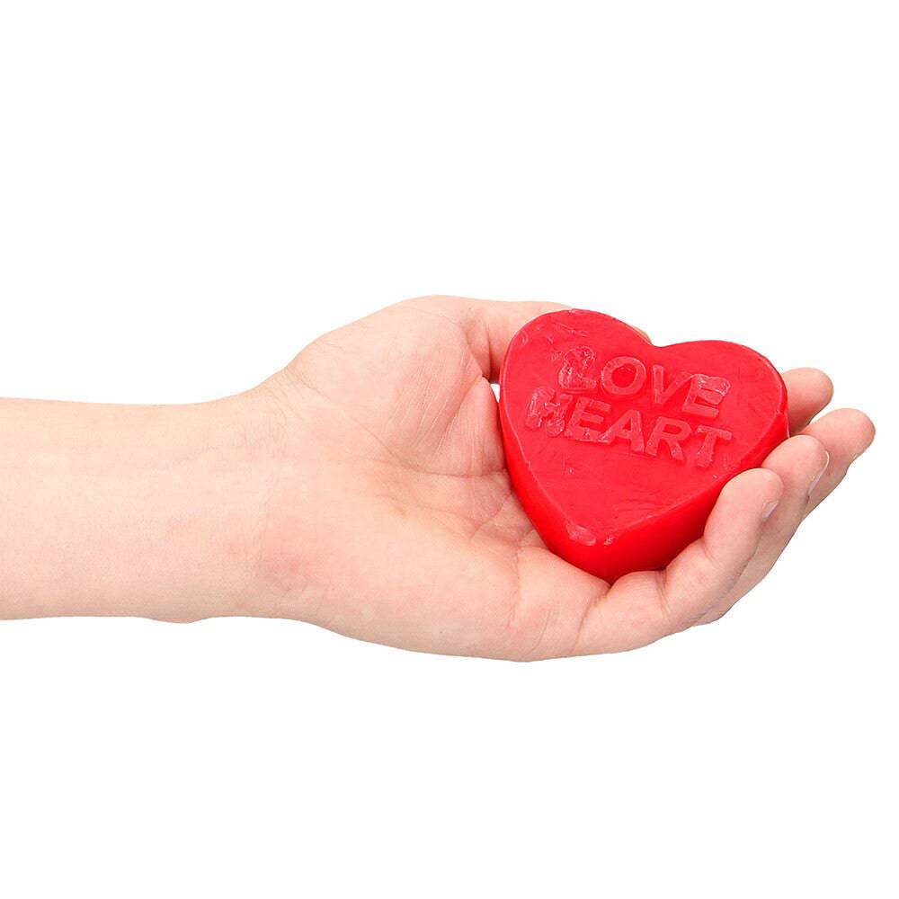 Kärlek hjärta ros doftande tvål bar from Shots Toys with floral heart design and soft pink color.