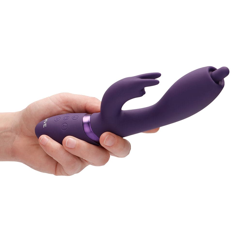 Vive Nilo purple pinpoint rotating G-spot rabbit with sleek design and textured details for enhanced pleasure.