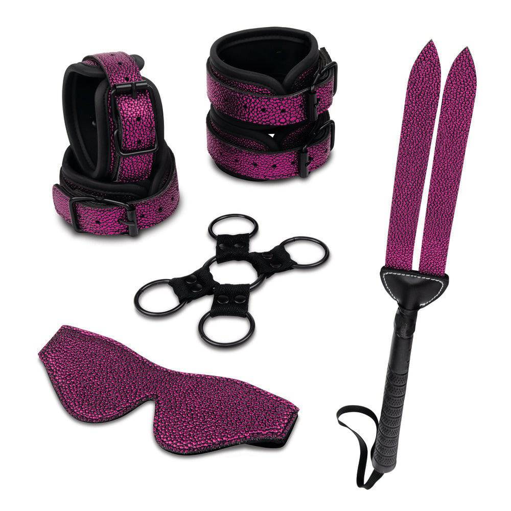 Whipsmart 7-piece bondage set in black leather, showcasing restraints, cuffs, and accessories in an arranged layout.