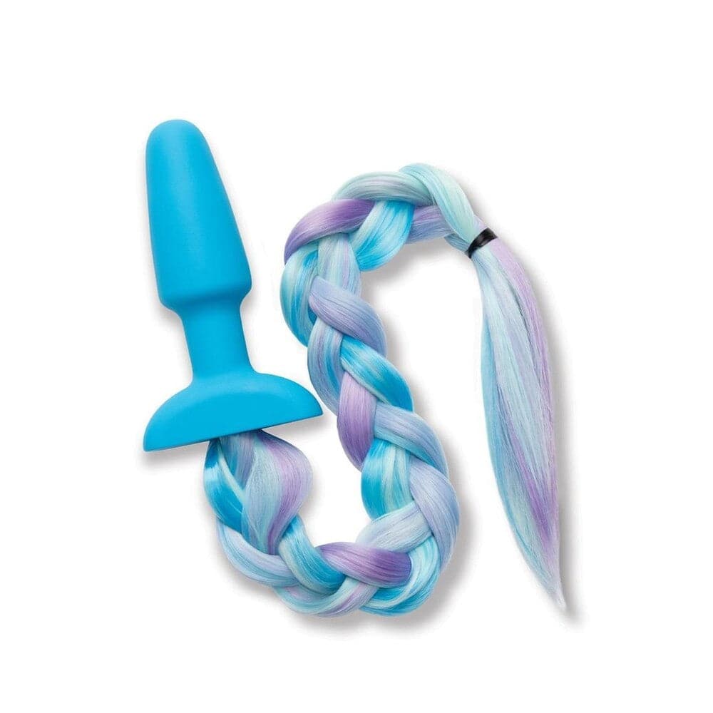 Whipsmart Furry Tales silicone unicorn tail butt plug with vibrant colors and textured design for playful enjoyment.