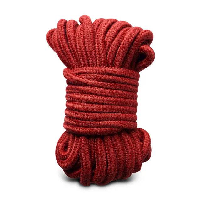 Red 10-meter bondage rope from Various Toy Brands, showcasing its texture and vibrant color in a coiled arrangement.