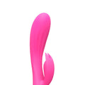 Silicone rabbit vibrator in vibrant colors, showcasing dual motors and ergonomic design for enhanced pleasure.