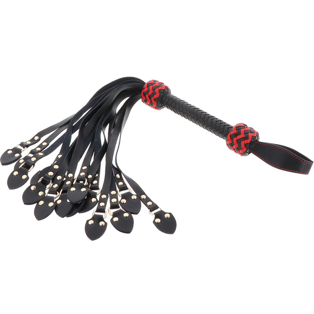 Hidden Desire CatoNine whip made of leather with intricate detailing and a comfortable grip, ideal for playful experiences.