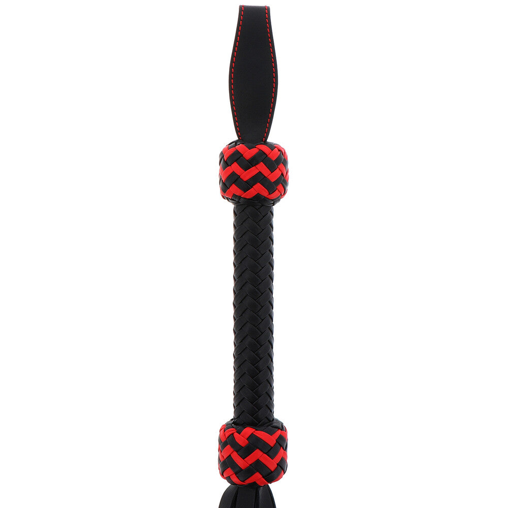 Hidden Desire CatoNine whip made of leather with intricate design and handle, perfect for playful adventures.