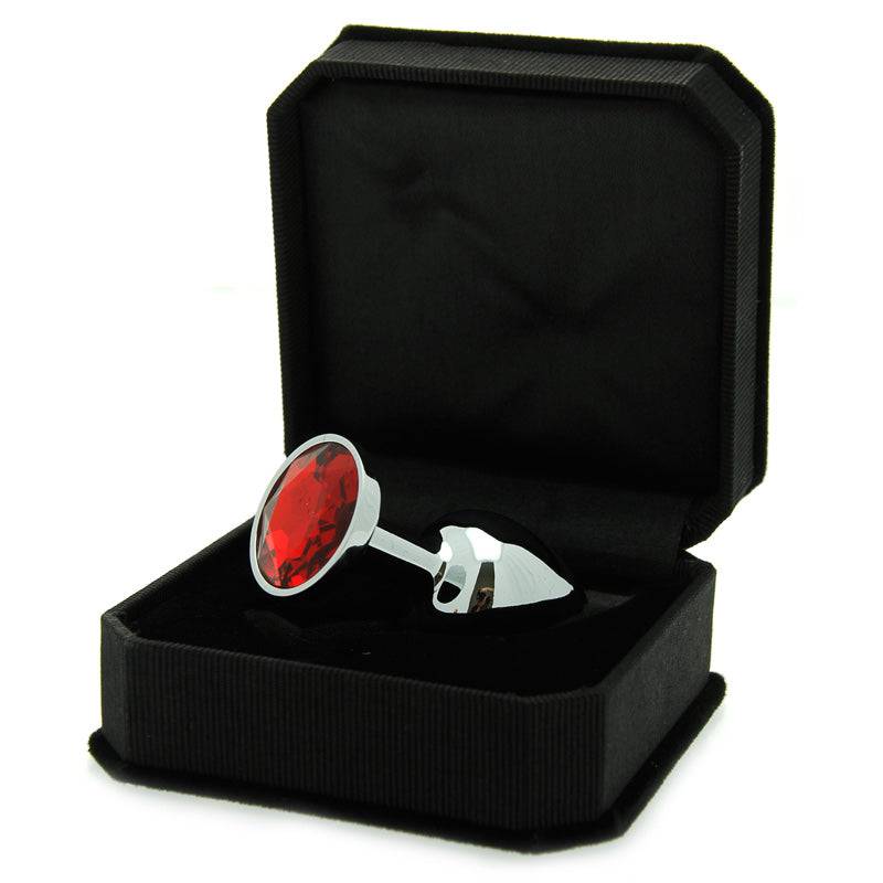 Rimba jewel butt plug with a sparkling gem and smooth silicone design, perfect for sensual experiences.