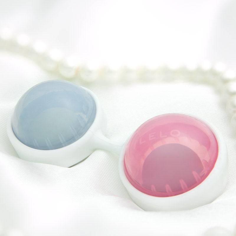 Lelo Luna Mini Pärlor in pink and blue, featuring a smooth, spherical design for intimate wellness.