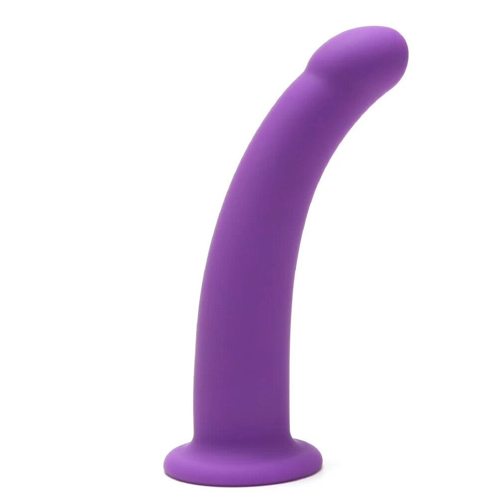 Me You Us 7-inch curved silicone dildo in soft pink, featuring a smooth surface and ergonomic design for comfort.