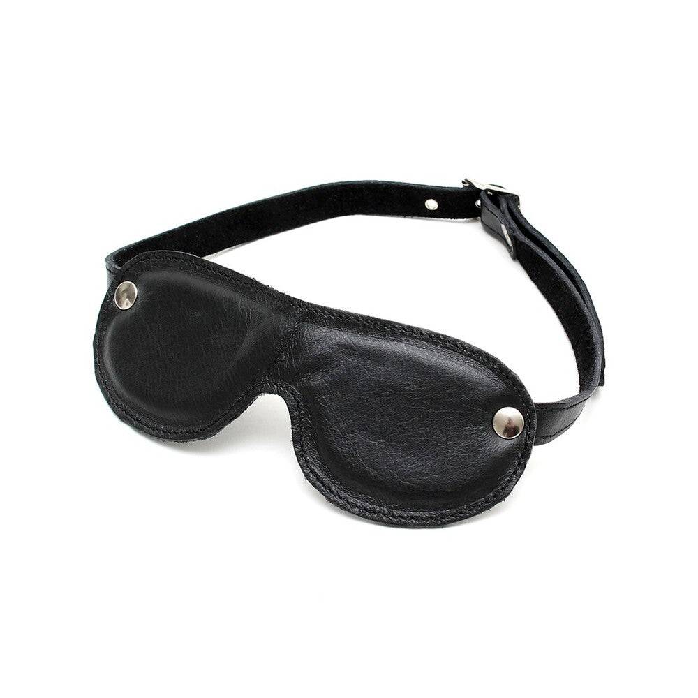 Rimba padded eye mask in black, featuring a soft texture and adjustable strap for comfort during sleep or relaxation.