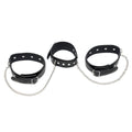 Rimba leather collar and leash set showcasing sleek black design and sturdy hardware for pets.