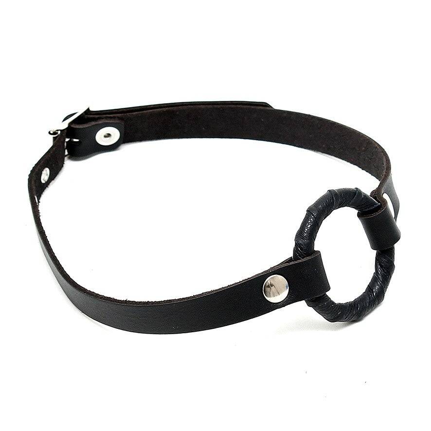 Rimba Gag with O-ring featuring a leather strap and adjustable buckle for comfortable wear.
