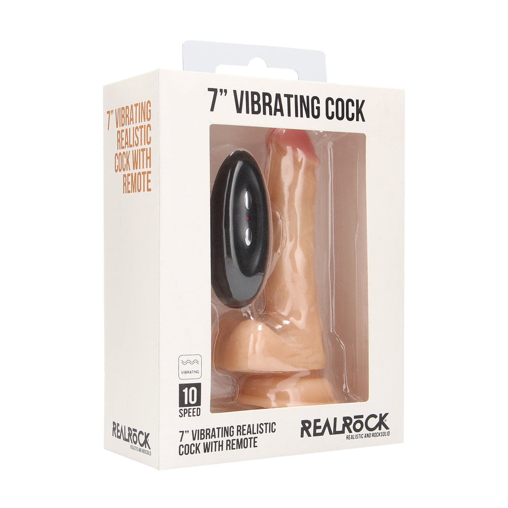 RealRock 7-inch vibrating realistic dildo with scrotum by Shots Toys, featuring lifelike details and textured surface.