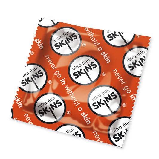 Skins Condoms Ultra Thin pack of 50, featuring a vibrant red design and sleek packaging for discreet use.