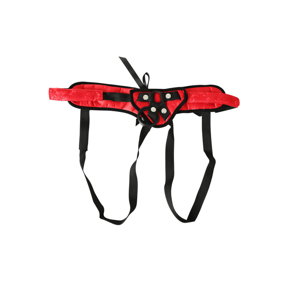 SportSheets red lace and satin corsette strap-on with adjustable straps and intricate detailing displayed on a neutral background.