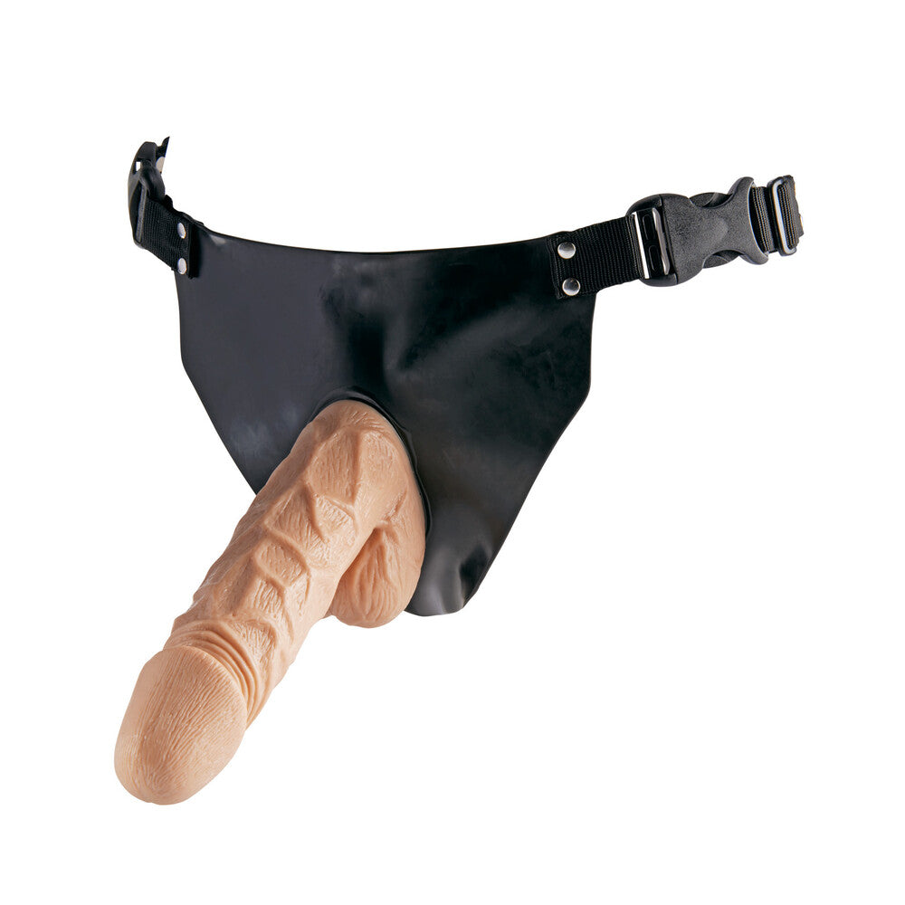 ToyJoy Super Woman strap-on dildo with realistic design and adjustable straps, displayed on a neutral background.