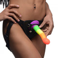 XR Brands Proud Rainbow silicone dildo with harness, showcasing vibrant colors and smooth texture.